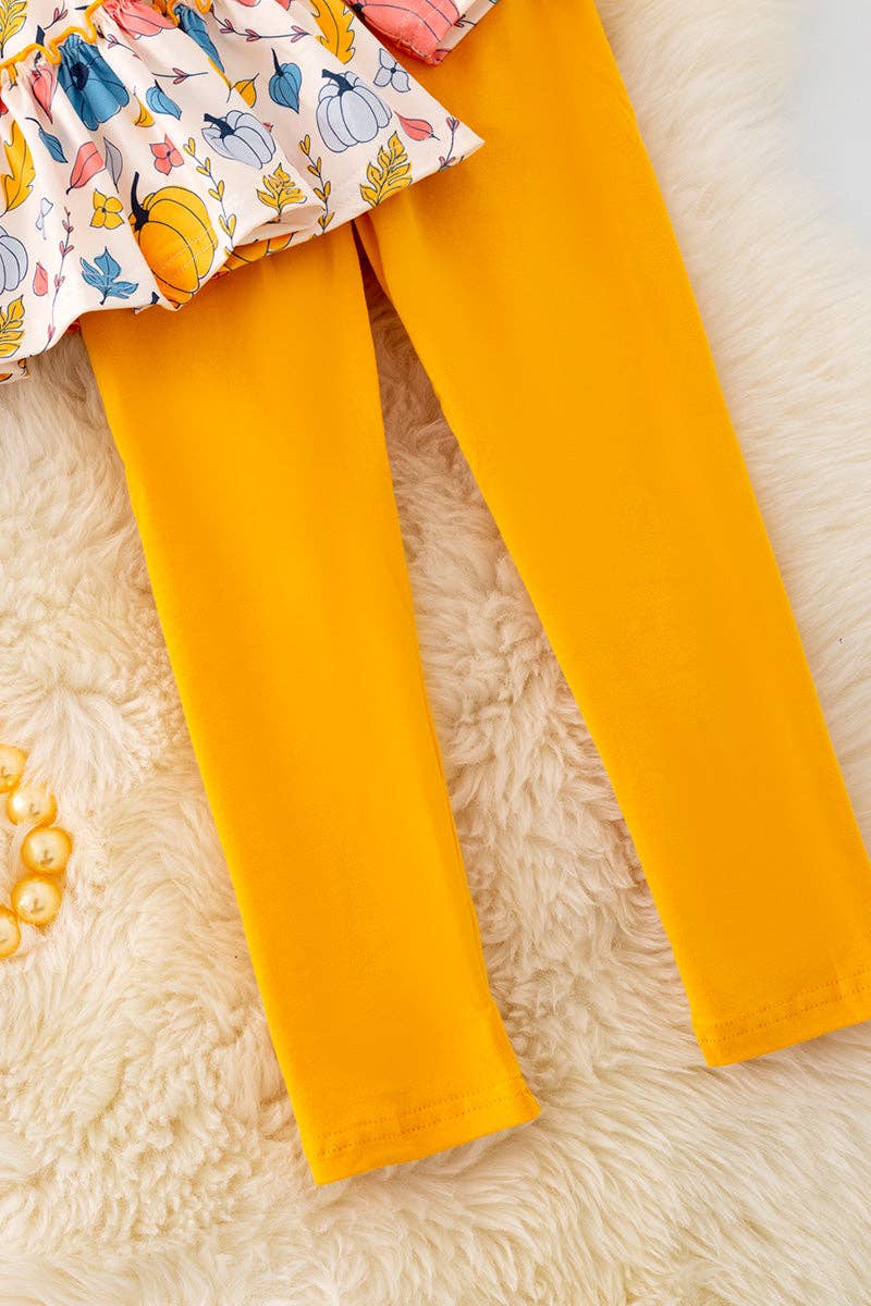 Pumpkin printed ruffle tunic & mustard leggings. OFG42046 SOL